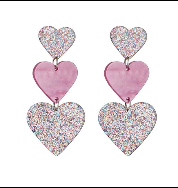 Aros tres corazón en color rosado
