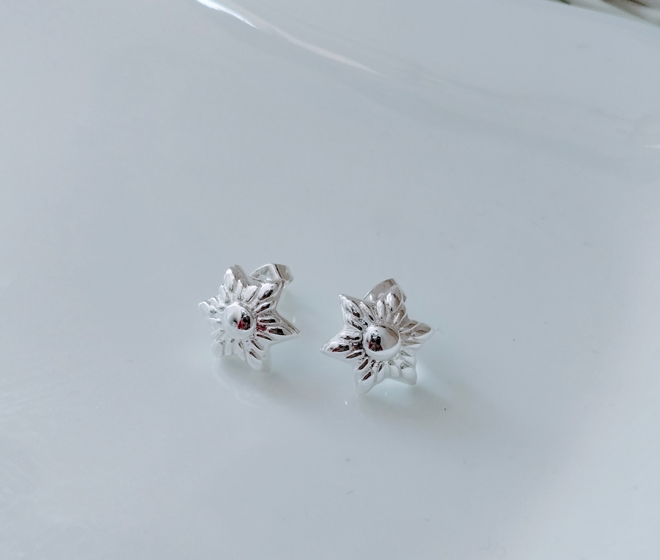 Aro flor bañada en plata
