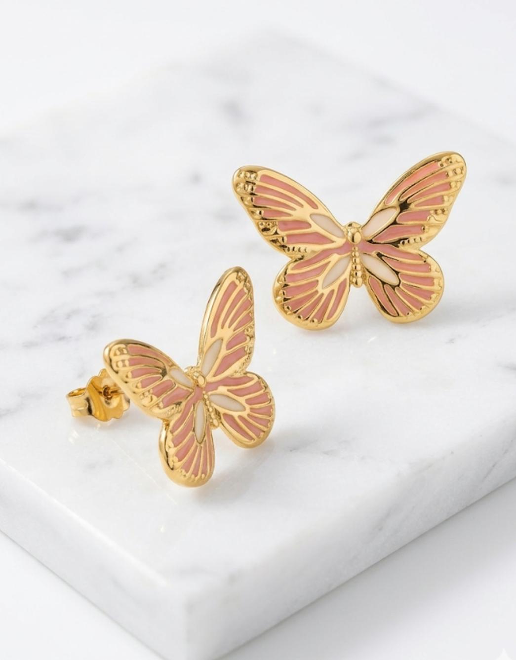 Aros mariposa color rosado en acero quirúrgico
